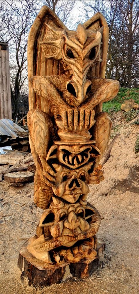 Dragon And Gargoyle Totem Pole Carved Completely With Chainsaws Wood