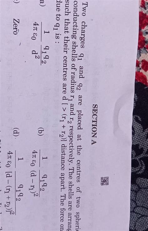 Section Atwo Charges Q1 And Q2 Are Placed At The Centres Of Two Spheri