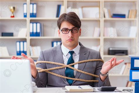 Businessman Tied Up With Rope In Office Stock Photo 512285 Crushpixel