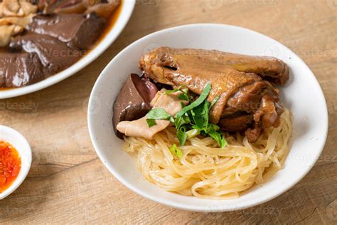 dried noodles with braised duck in white bowl 20916198 Stock Photo at ...