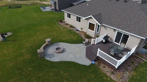 Raised Deck to Patio with Fire Pit and Seat Wall in West Fargo, ND ...