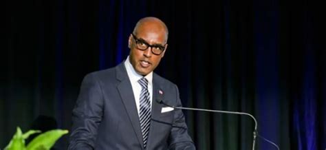 bermudas  finance minister stays mum  reasons  shock