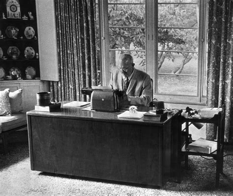 British Novelist Pg Wodehouse Works At His Typewriter At His Long