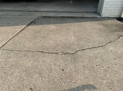 Keystone Basement Systems Before & After Photo Set - Concrete Driveway Repair