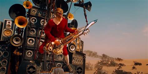 Mad Max Who Is Fury Roads Guitar Guy Origins And Actor Explained