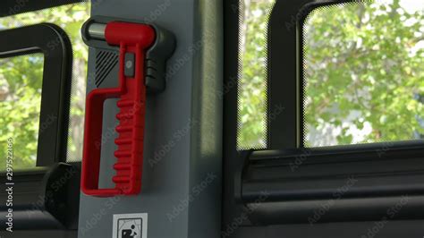 Stockfoto Safety Hammer Mounting In Bus Used For Breaking The Window In Case Of Accident