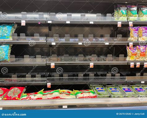 Empty Produce Department Shelves At A Publix Grocery Store Due To The