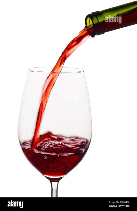 Red Wine Is Poured Into A Wine Glass Stock Photo Alamy