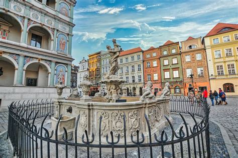 Fountain With A Statue On An Old Market Square In Daytime Editorial