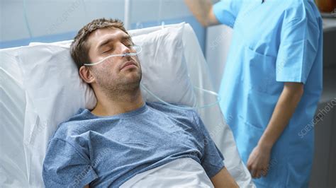 Man Sleeping In Hospital Bed