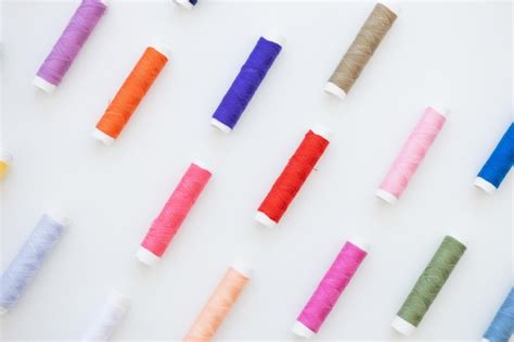 Premium Photo Colorful Thread Spool Background Closeup