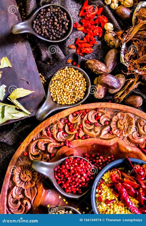 Top View Spices And Herbs Ingredient Decoration On Wood Table For Cook