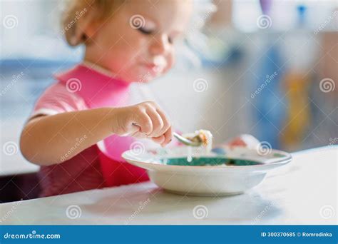 Adorable Baby Girl Eating From Spoon Vegetable Noodle Soup Healthy