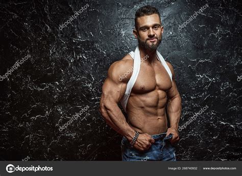 Portrait Of Strong Healthy Handsome Athletic Man Fitness Model Posing