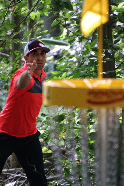 Paul Mcbeth Putting Out Hole 4 At Iron Hill Dgc During The Delaware Disc Golf Challenge Pdga