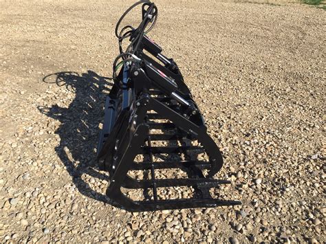 New Dirt Trax Debris Grapple Kuipment Locator