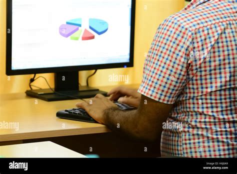 A man typing on computer keyboard Stock Photo - Alamy