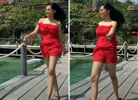 Amrita Rao soaks in the sun in red romper, plays BTS’ ‘Dynamite’ in her ...