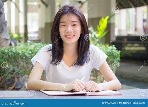 Asia Thai China Student University Beautiful Girl Write A Book Stock