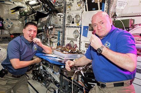 Astronauts Eating Food Grown In Space Photograph by Nasa - Pixels