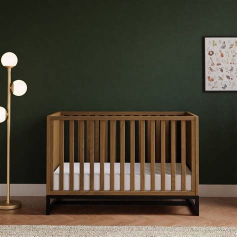 The Clean Lines And Chic Metal Base Of The Ryder In Crib Will Bring