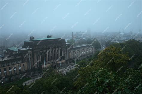 Premium Photo View Of Edinburgh Covered In Fog From Calton Hill And