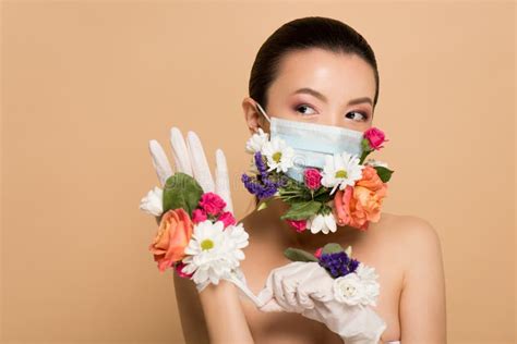 Attractive Nude Asian Girl In Floral Face Mask Wearing Latex Gloves Stock Photo Image Of
