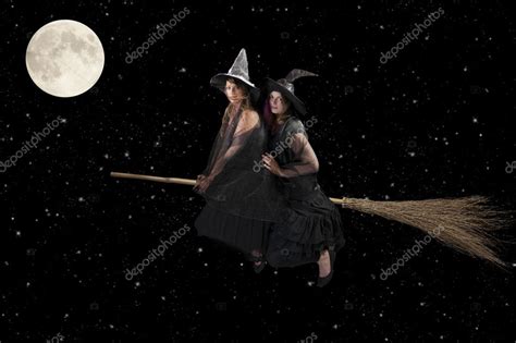 Two Halloween Witches Flying On A Broom Stock Photo Aldegonde 12460934