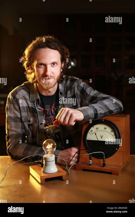 Bearded Caucasian Electric Man Posing With An Electric Bulb And Vintage