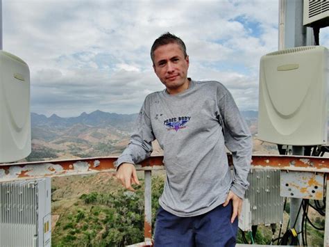 Premium Photo Portrait Of Smiling Mature Man Standing At Observation