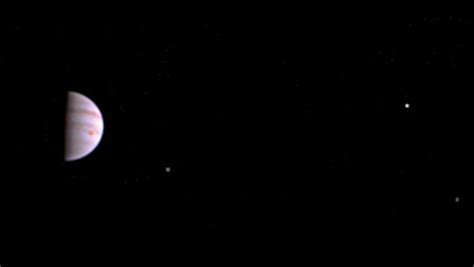 Juno Sends First View Of Jupiter And Its Moons