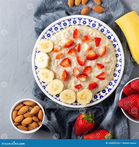 Oatmeal Porridge With Strawberries Banana And Almonds Healthy