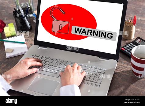 Warning concept shown on a laptop screen Stock Photo - Alamy