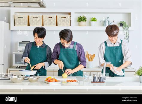 Japanese Men Cooking Stock Photo Alamy