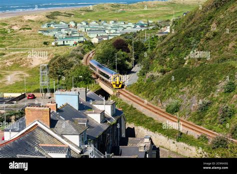 Train On The Cambrian Coast Line At Aberdovey Gwynedd Wales Stock