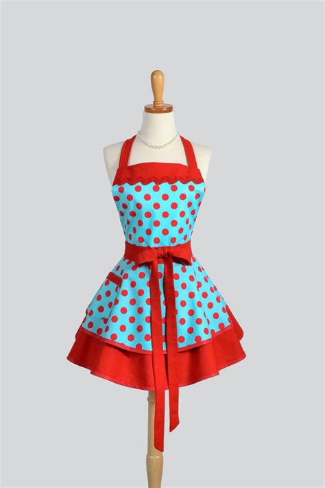 A Womans Apron With Red And Blue Polka Dots On It Tied To A Mannequin