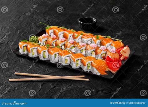 Torched Salmon Aburi Saikyo Sushi With Sweet Sauce On White Plate