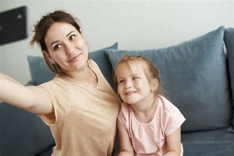 Premium Photo Close Up On Mother Teaches Daughter