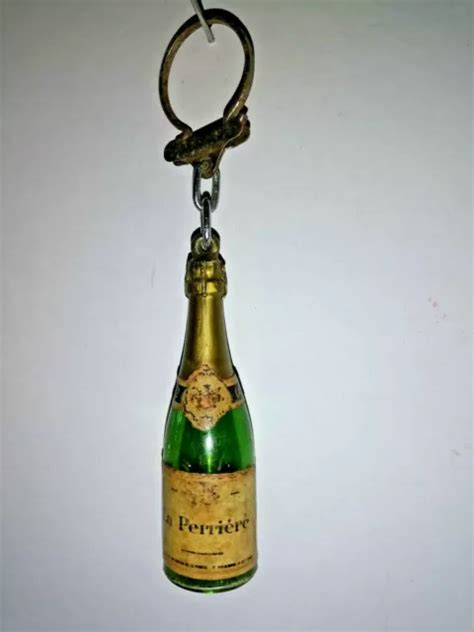 PORTE CLÉS MIGNONNETTE D ALCOOL années 60 70 GRAND CREMANT LA