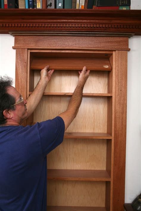 Hidden Pivot Bookcase Installation Thisiscarpentry Secret Rooms