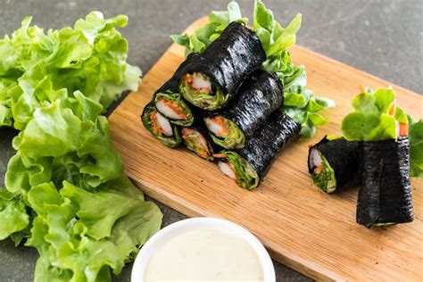 Premium Photo | Seaweed salad roll with crab stick