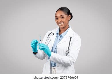Happy Mature African American Lady Doctor Stock Photo