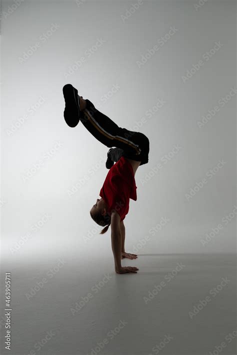 Isolated Young Russian Girl Wearing Red T Shirt Hip Hop Break Dancer