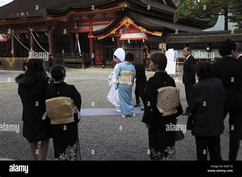 A Japanese Bride In Traditional Wedding Kimono During A Shinto Wedding