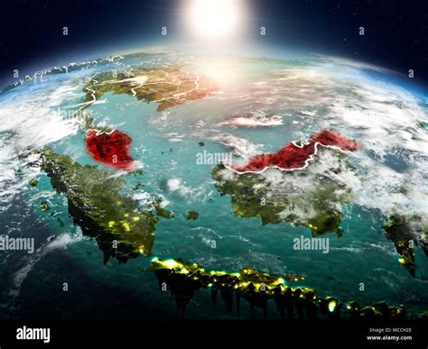 Sunrise Above Malaysia Highlighted In Red On Model Of Planet Earth In