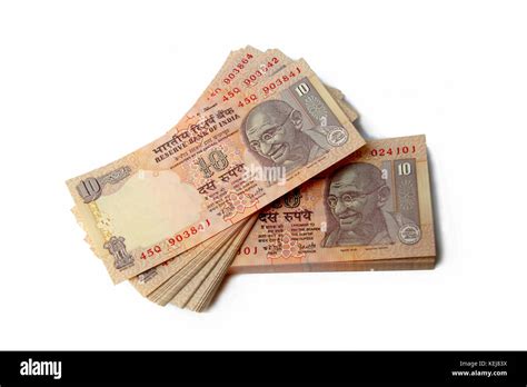 Stack Of Indian Currency Notes Of Ten Rupee Denomination Bearing Mahatma Gandhis Portrait Stock