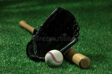 Baseball Bat Glove And Ball Lying On Green Grass Stock Photo Image