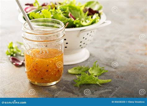 Italian Vinaigrette Dressing in a Mason Jar Stock Photo - Image of mediterranean, garlic: 85658320