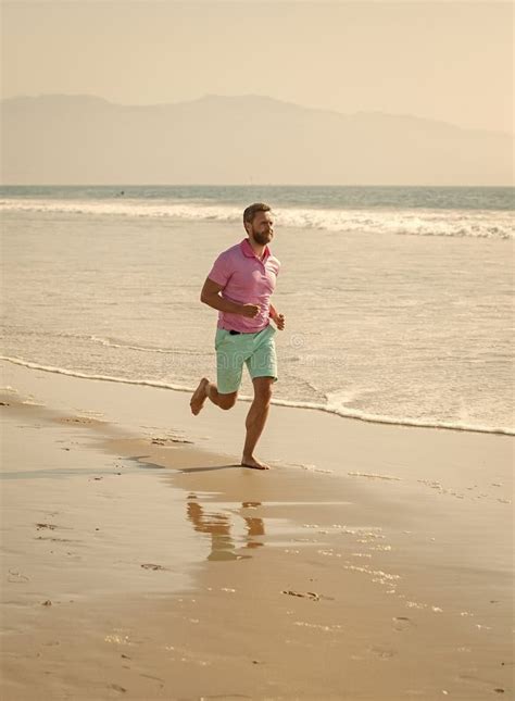 Mature Sporty Man Runner Sprinting On Beach Outdoor Marathon Stock Photo Image Of Athletic