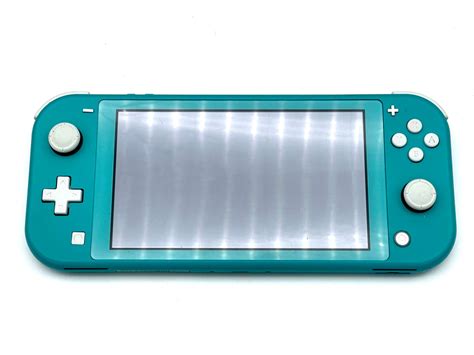 Turquoise Nintendo Switch Lite Handheld Console The Game Island